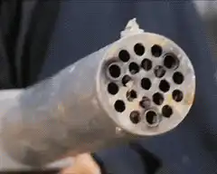 Multi-barrel rocket launcher firing
