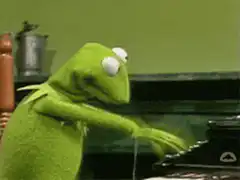 Kermit the Frog playing piano