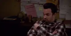 Jim Halpert shrugs and makes a face
