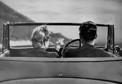 Couple in convertible car