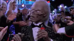 Skeleton in tuxedo at a party