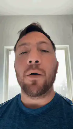 Man blinking and talking