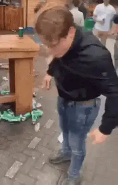 man vomiting on the street