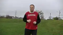 Man in Canada shirt dancing