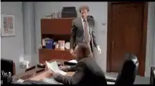 Michael Scott and Dwight kissing