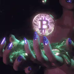 Glowing Bitcoin in hands
