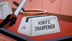Hand sharpening knife in soup
