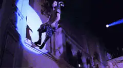 Man crowd surfing on balcony
