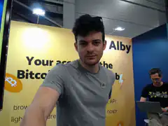 Man at Alby Bitcoin booth