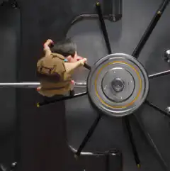 Boy spins bank vault door