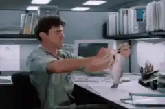 Dwight Schrute throws a fish on TPS reports