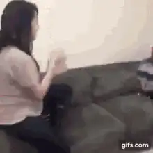 Man throws Christmas tree on woman