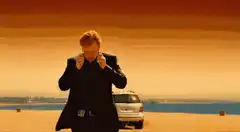 John Travolta walking away from explosion