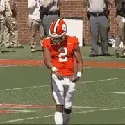 Clemson football player dancing on field