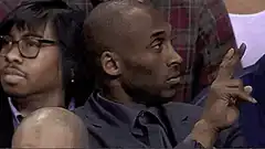 Kobe Bryant clapping and turning around