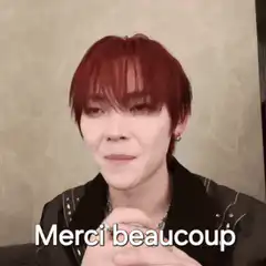 Red-haired man says Merci beaucoup