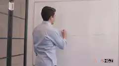 man drawing graph on whiteboard