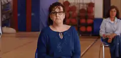 Woman shaking head no in gym