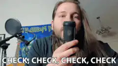 Man checking microphone