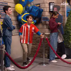 Geek dancing behind velvet rope