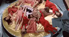 Women in red on golden bed