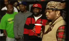 Lil Jon holding a red cup and nodding