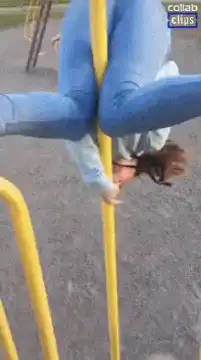 Girl falls off yellow pole