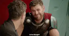Thor smirking at Loki