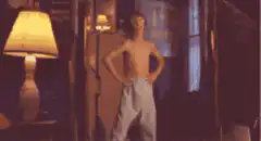 Young boy dancing in his room