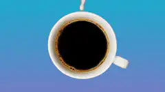 Sugar cube forms heart in coffee