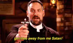 Priest with cross says get thee away from me Satan