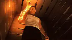 John Travolta set on fire