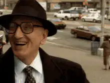 Milton Waddams laughing then getting hit