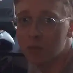 guy with glasses staring intensely