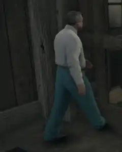 Man in blue pants walking in circles