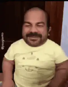 Man in yellow shirt laughing