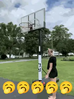 girl makes basketball shot
