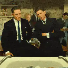 Men watching money get shredded