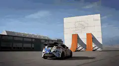 car drives up curved ramp