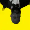 Upside down man in tuxedo