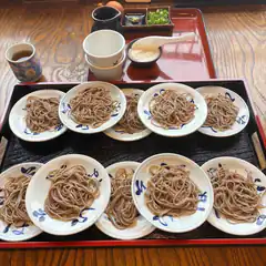 multiple plates of soba noodles