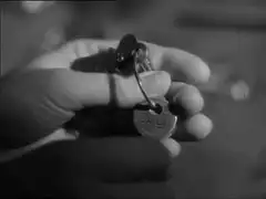 Hand holding UNICA keys