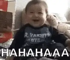 Baby laughing hysterically and falling over