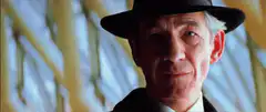 Ian McKellen as Gandalf tipping his hat