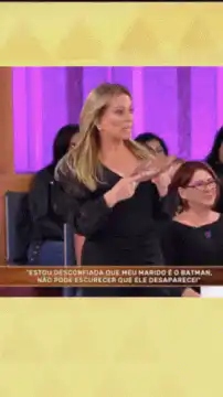 Woman clapping at TV show