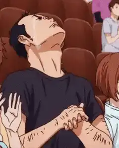 Man crying in theater