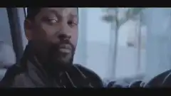 Denzel Washington smoking and smiling