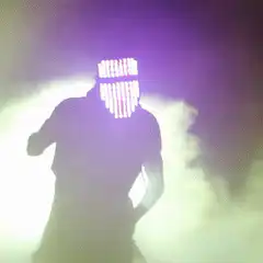 LED mask dancer in smoke