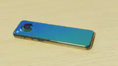 Iridescent smartphone on wood