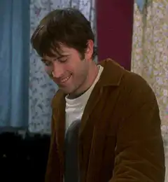 Josh Hopkins smiling and gesturing